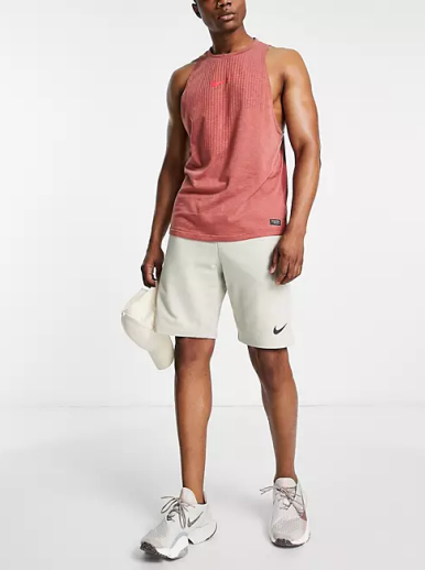 Nike Training Dri-FIT fleece shorts in stone