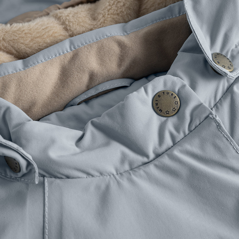 MATWANG Winterjacke mit Fleecefutter und Fellbesatz. GRS