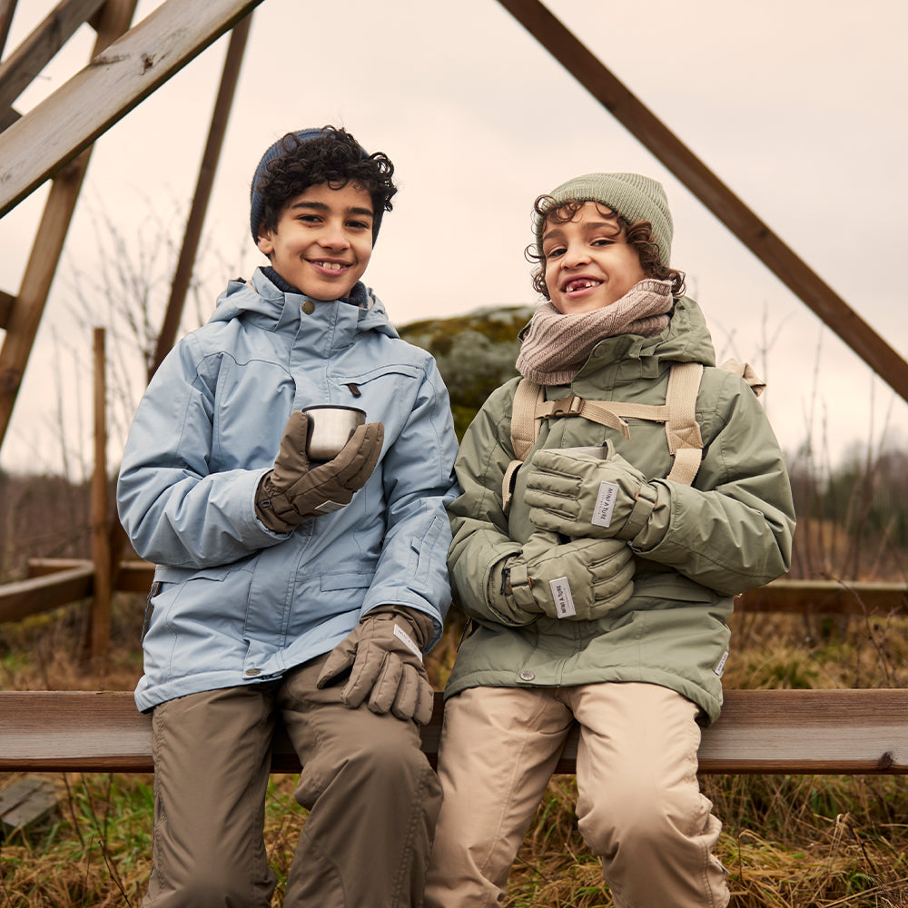 MATVESTYN Winterjacke mit Fleecefutter und Fellbesatz. GRS