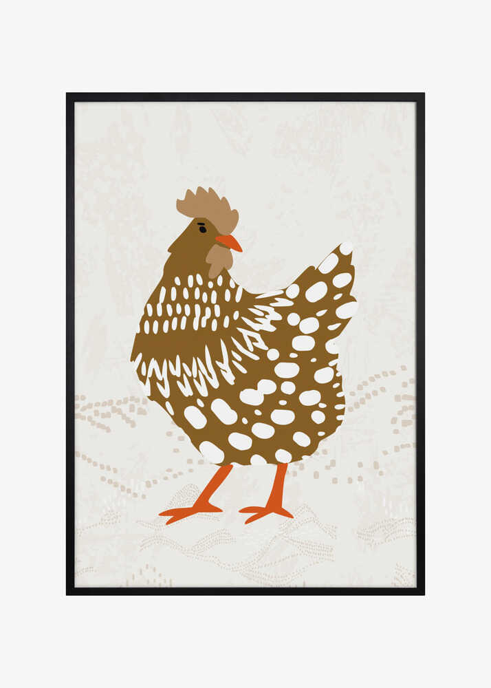 Brown hen on the grass