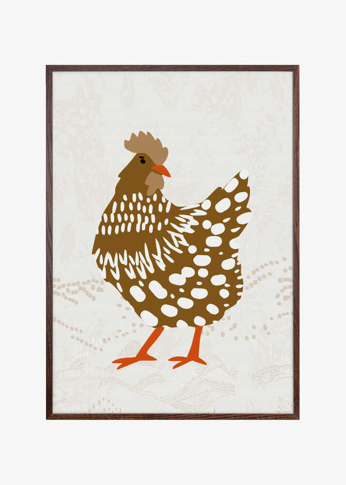 Brown hen on the grass