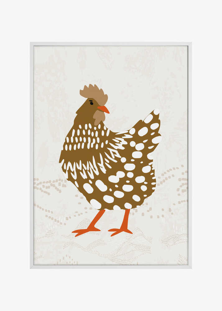 Brown hen on the grass