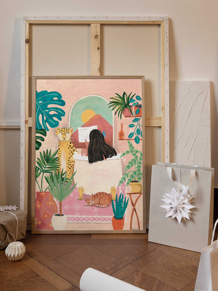 Woman taking bath in pink tropical bathroom