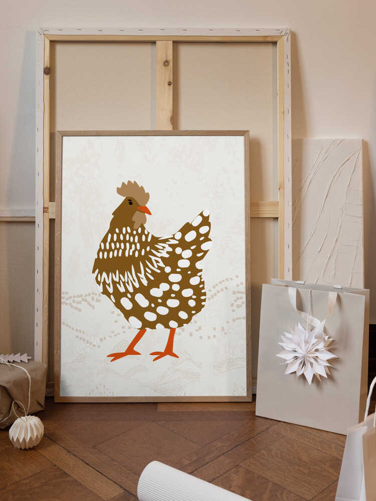 Brown hen on the grass