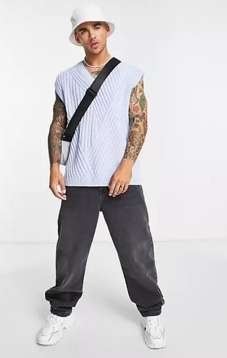 ASOS DESIGN sleeveless sweater with travelling rib in blue