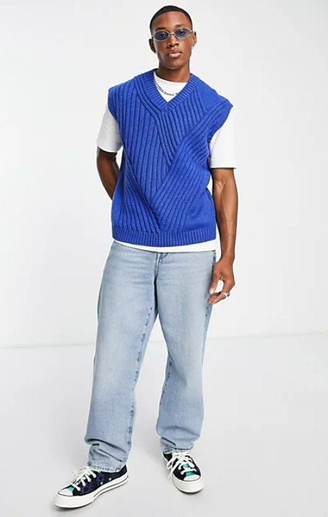 ASOS DESIGN sleeveless sweater with travelling rib in blue