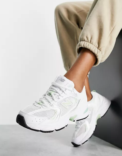 New Balance 530 trainers in white and pastel green - exclusive to ASOS