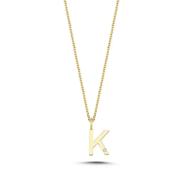 Bogstavvedhæng K m. 1 x 0,005 ct. W/SI 9,5 mm - 14 kt. Guld fra Nuran