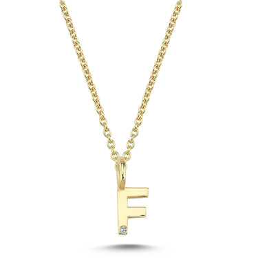Bogstavvedhæng F m. 1 x 0,005 ct. W/SI 6,5 mm. - 14 kt. Guld fra Nuran