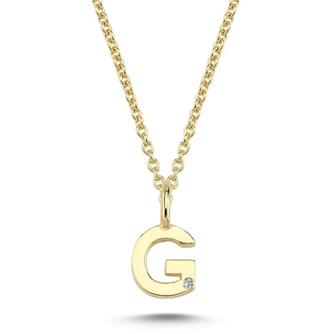 Bogstavvedhæng G m. 1 x 0,005 ct. W/SI 6,5 mm. - 14 kt. Guld fra Nuran