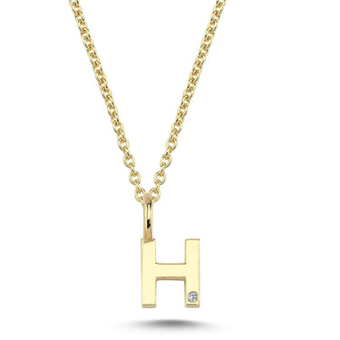 Bogstavvedhæng H m. 1 x 0,005 ct. W/SI 6,5 mm. - 14 kt. Guld fra Nuran