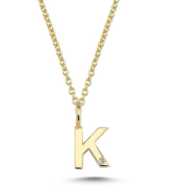 Bogstavvedhæng K m. 1 x 0,005 ct. W/SI 6,5 mm. - 14 kt. Guld fra Nuran