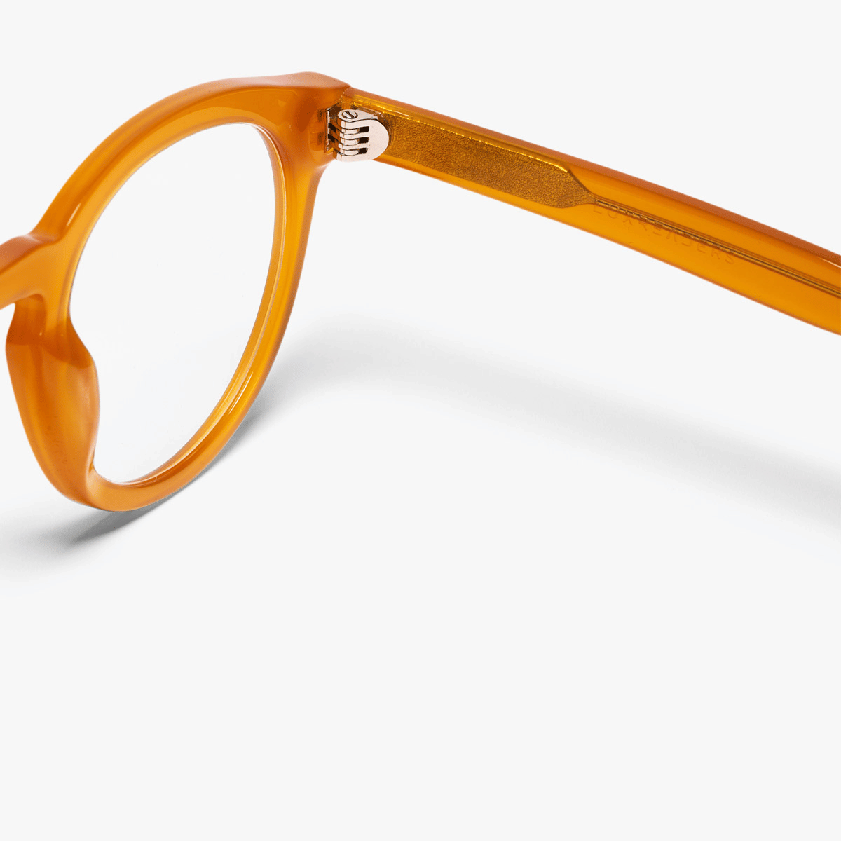 Luxreaders stylish Women's Gråsten Crystal Honey Reading glasses. Made from Bio-acetate in a Round shape.